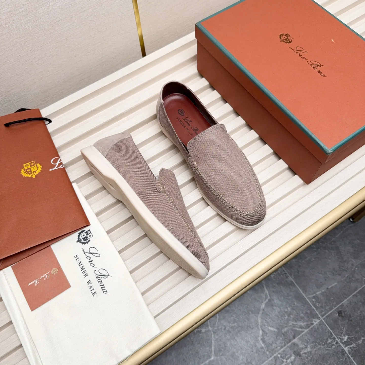 Men's Men's Shoes 💰400 Loro PIana moccasins are made of wish wool fabric. The upper is made of knitted fabric, made on a loom, and then attached to a rubber sole. The Rain System's water-repellent treatment enhances the shoe's functional design, while the suede details give the shoe a sense of elegance and sophistication. Made from Wish, fine wool from Australian and New Zealand Merino sheep
